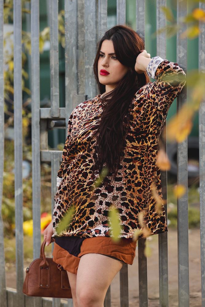 Buy Animal Print Button Up Sleeve Dip Hem Top in Bulk